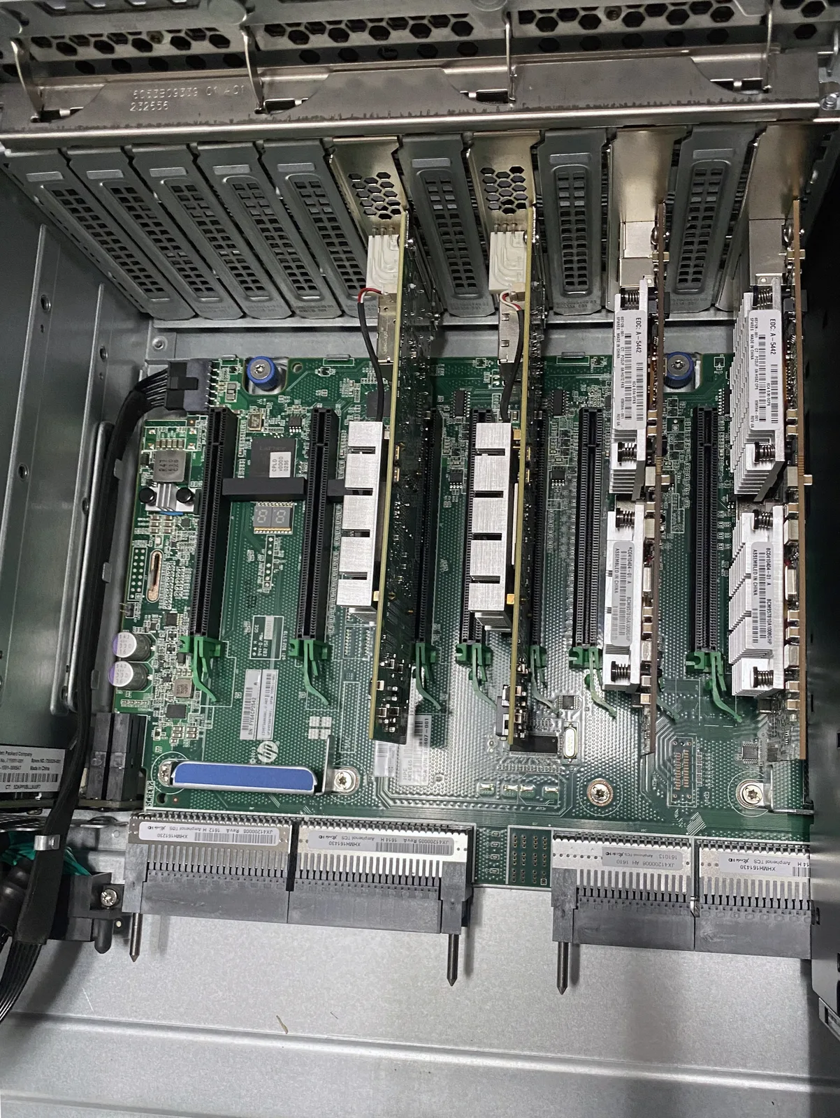 Home 21 BitNetica technician servicing internal server memory and expansion cards during a managed IT maintenance visit