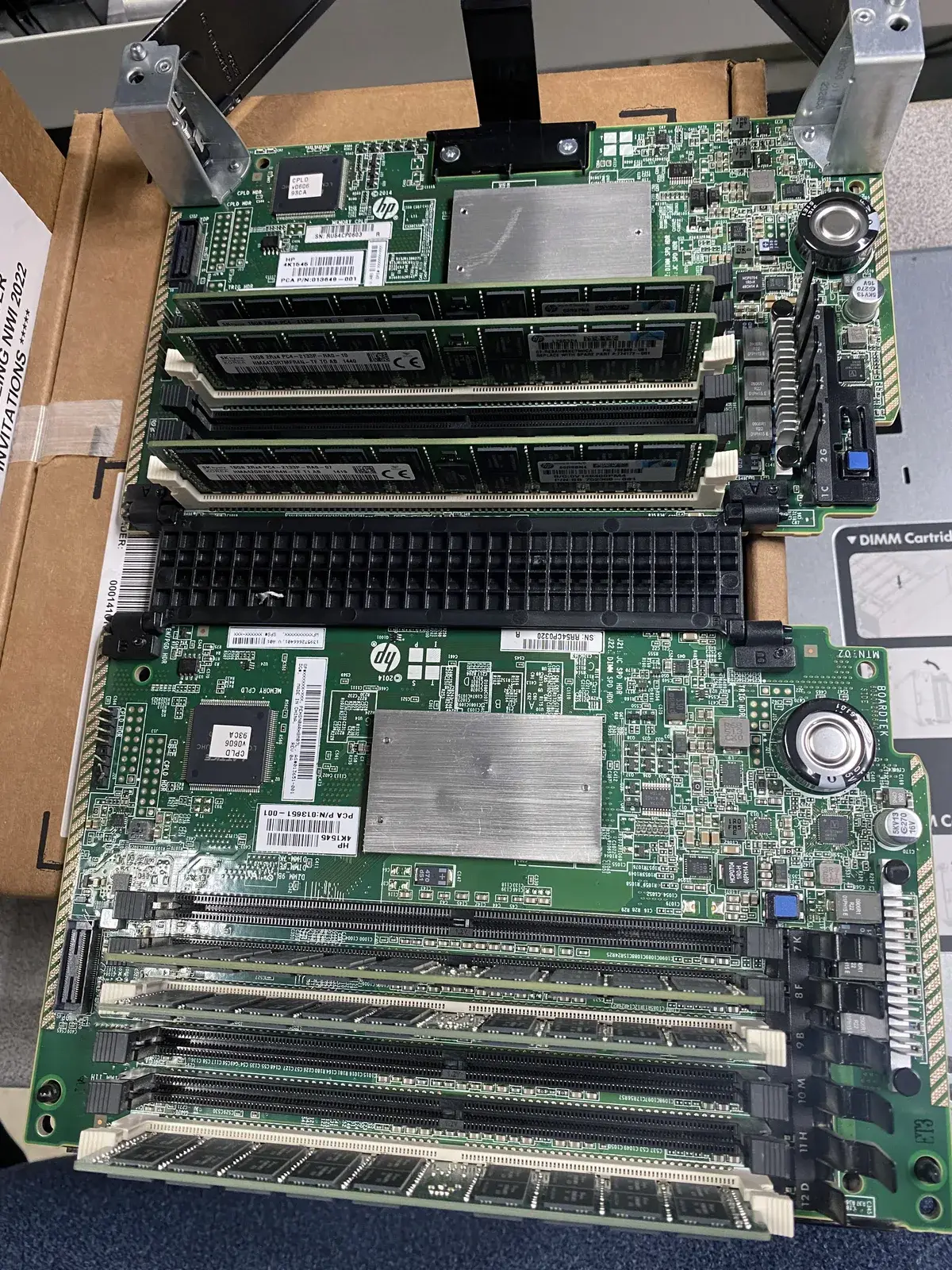 Home 22 Server motherboard and memory DIMM cartridge being serviced by BitNetica IT technicians